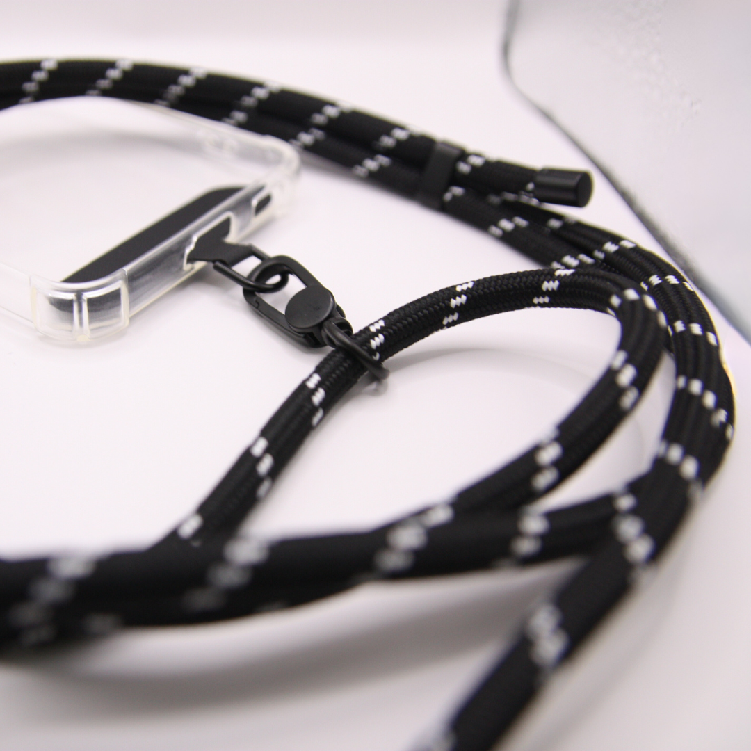 Close-up on the black and white stripes crossbody phone strap rope.