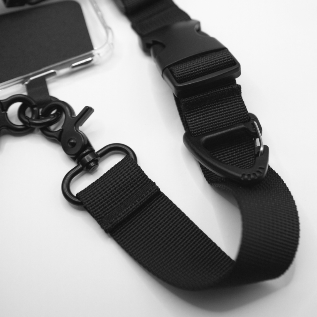 Close-up of the 2-in-1 Utility Lanyard Crossbody phone strap black. 