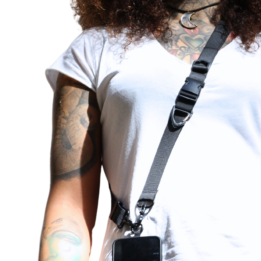 Close-up on the front. Wearing 2-in-1 Utility Lanyard Crossbody phone strap black. 